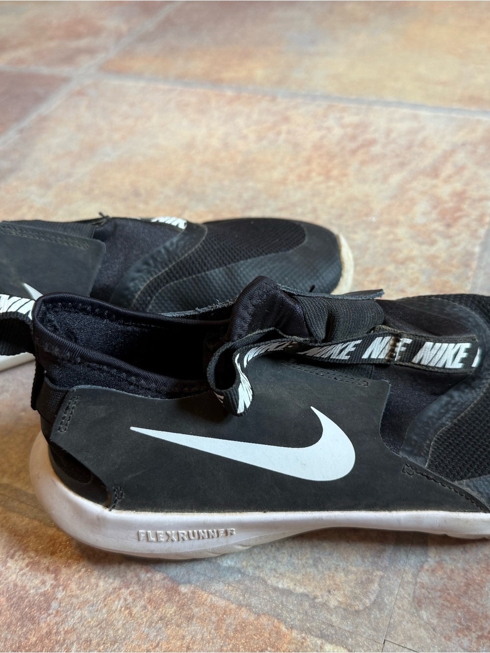 Nike Black Slip-On Flex Runner Sneakers with White Swoosh